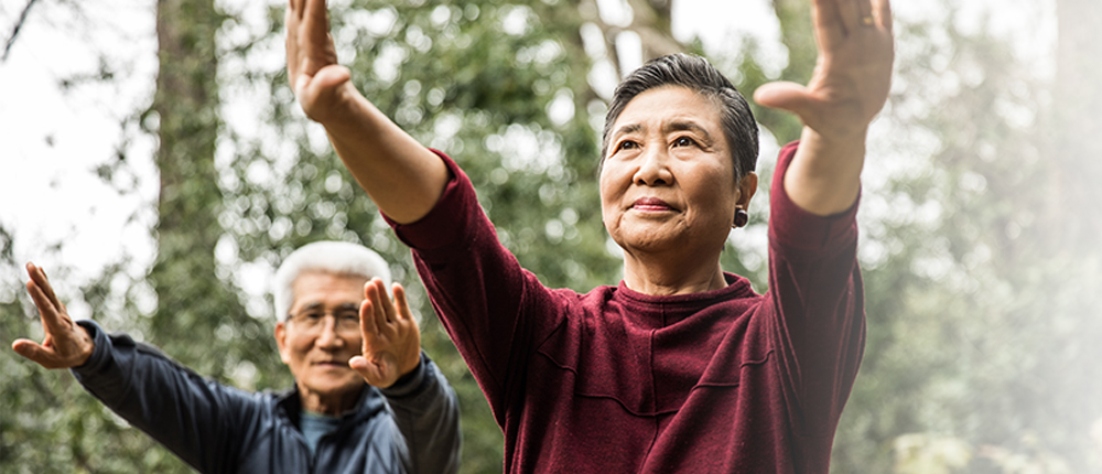 Image of older adults doing tai chi