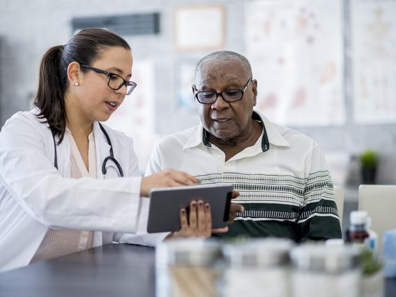 Doctor With A Tablet Computer